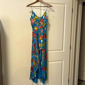 Beautiful, colorful, fun and cheeky summer dress. Like new — worn only 2 times.